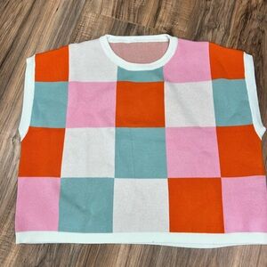 Ladies sleeveless sweater.